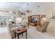 Relaxing living room with two couches, a coffee table, and built-in shelving at 11544 Mcleod St, Spring Hill, FL 34609