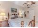 Main bedroom with a king-size bed and ensuite bath at 11544 Mcleod St, Spring Hill, FL 34609
