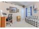 Home office with desk, chair, and sofa at 11544 Mcleod St, Spring Hill, FL 34609