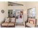 Bright sunroom with wicker furniture and view of backyard at 11544 Mcleod St, Spring Hill, FL 34609