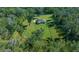 Aerial view of property showing house and surrounding land at 12141 Hermes Ct, Brooksville, FL 34601