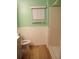 Clean bathroom with a toilet, shower, and vanity at 12443 Tansboro St, Spring Hill, FL 34608