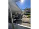 Back patio with screen enclosure and pool at 12635 Colony Rd, Hudson, FL 34669