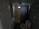 Bathroom with a shower/tub combo and a toilet at 12924 Manatee Ave, New Port Richey, FL 34654