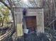 Small dilapidated shed in need of repair at 12924 Manatee Ave, New Port Richey, FL 34654