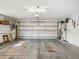 Spacious two-car garage with ample storage shelving and space for tools at 1928 Gulfview Dr, Holiday, FL 34691