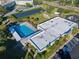 Aerial view of community pool and solar panels at 2210 Utopian E Dr # 212, Clearwater, FL 33763