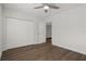 Spacious bedroom with hardwood floors and double door closet at 2210 Utopian E Dr # 212, Clearwater, FL 33763