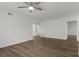 Living room featuring hardwood floors and ceiling fan at 2210 Utopian E Dr # 212, Clearwater, FL 33763