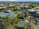 Shuffleboard and tennis courts in a community setting at 2210 Utopian E Dr # 212, Clearwater, FL 33763