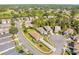 Aerial view of house nestled in a community with lush green spaces at 4201 Silver Berry Ct, Spring Hill, FL 34609