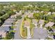 Aerial view showcasing a house and neighborhood, highlighting its location at 4201 Silver Berry Ct, Spring Hill, FL 34609