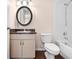 Clean bathroom with a toilet, bathtub, and vanity with a mirror at 4201 Silver Berry Ct, Spring Hill, FL 34609