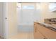 Clean bathroom with a bathtub and granite countertop at 4201 Silver Berry Ct, Spring Hill, FL 34609
