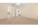 Spacious bedroom with neutral walls and carpet flooring at 4201 Silver Berry Ct, Spring Hill, FL 34609