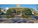 Elegant clubhouse entrance with landscaping and brick accents at 4201 Silver Berry Ct, Spring Hill, FL 34609