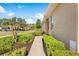 Side view of a single-Gathering home showcasing its exterior and landscaping at 4201 Silver Berry Ct, Spring Hill, FL 34609