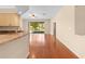 Living room with hardwood floors and access to the backyard at 4201 Silver Berry Ct, Spring Hill, FL 34609