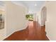 Hardwood floor living room with view to backyard at 4201 Silver Berry Ct, Spring Hill, FL 34609