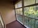 Screened balcony with access to the outdoors at 4739 Myrtle Oak Dr # 22, New Port Richey, FL 34653