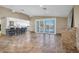 Living area with water views and kitchen access at 5517 Manatee Point Dr, New Port Richey, FL 34652