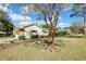 Charming single-story home with attached garage and manicured lawn at 7385 Royal Oak Dr, Spring Hill, FL 34607