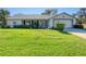 Single story home with well maintained lawn at 8500 Forest Glade Dr, Hudson, FL 34667