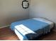 Spacious bedroom with light wood flooring at 8525 Gandy Ln, Port Richey, FL 34668