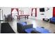 Community room with pool table and seating area at 9980 Eagles Point Cir # 3, Port Richey, FL 34668