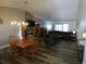Dining area with wood table and chandelier at 9980 Eagles Point Cir # 3, Port Richey, FL 34668