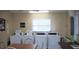 Shared laundry room with multiple washers and dryers at 9980 Eagles Point Cir # 3, Port Richey, FL 34668