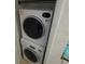 Stackable washer and dryer in a closet at 9980 Eagles Point Cir # 3, Port Richey, FL 34668