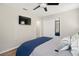 Comfortable bedroom with a queen-size bed and built-in closet at 10464 Henderson St, Spring Hill, FL 34608