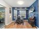 Charming breakfast nook with a blue accent wall at 10464 Henderson St, Spring Hill, FL 34608