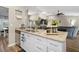 Modern kitchen with white cabinets and granite countertops at 10464 Henderson St, Spring Hill, FL 34608