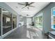 Spacious lanai with pool access and plenty of natural light at 10464 Henderson St, Spring Hill, FL 34608