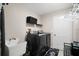 Laundry room with washer, dryer, and utility sink at 10464 Henderson St, Spring Hill, FL 34608