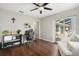 Home office with sliding glass doors leading to the pool at 10464 Henderson St, Spring Hill, FL 34608
