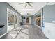 Bright, screened pool area with lounge chairs and a large pool at 10464 Henderson St, Spring Hill, FL 34608
