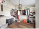 Large walk-in closet with ample shelving and hanging space at 10464 Henderson St, Spring Hill, FL 34608