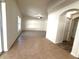 Spacious living room with tile and wood flooring and plenty of natural light at 12336 Southbridge Ter, Hudson, FL 34669