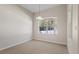 Cozy breakfast nook with tile floors and large window at 12739 Balsam Ave, Hudson, FL 34669