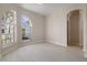 Sunlit dining area with hardwood floors and large windows at 12739 Balsam Ave, Hudson, FL 34669
