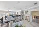 Kitchen with granite countertops and bar seating at 13610 Evelane Dr, Hudson, FL 34667