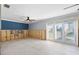 Renovation in progress, kitchen with French doors and tile floors at 13610 Evelane Dr, Hudson, FL 34667