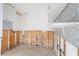 Kitchen under renovation, white cabinets, gray wallpaper at 13610 Evelane Dr, Hudson, FL 34667