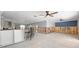 Under renovation, kitchen features island and barstools at 13610 Evelane Dr, Hudson, FL 34667