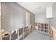 Laundry room undergoing renovations, features gray wallpaper at 13610 Evelane Dr, Hudson, FL 34667