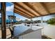 Granite outdoor kitchen with seating, perfect for entertaining at 13610 Evelane Dr, Hudson, FL 34667