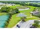 Aerial view of community amenities including tennis and basketball courts, playground, and pool at 13722 Crest Lake Dr, Hudson, FL 34669